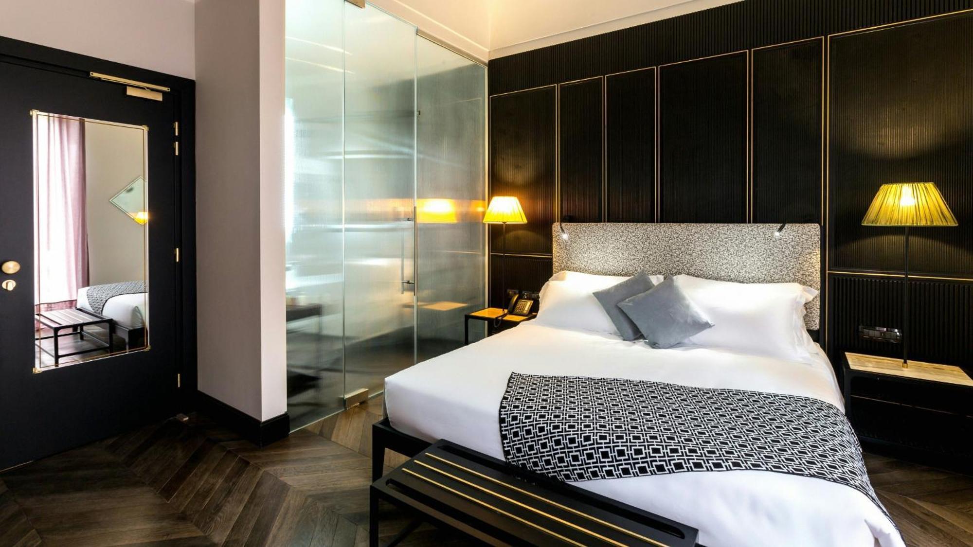 ดิ ออล เทเลอร์ สวีท โรมา Hotel ภายนอก รูปภาพ A bedroom at the hotel
